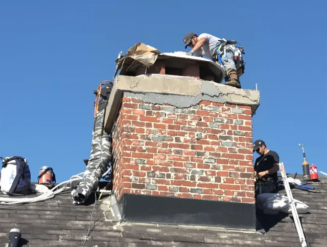 Horizon West Chimney Sweep installing a custom chimney crown in Horizon West, FL